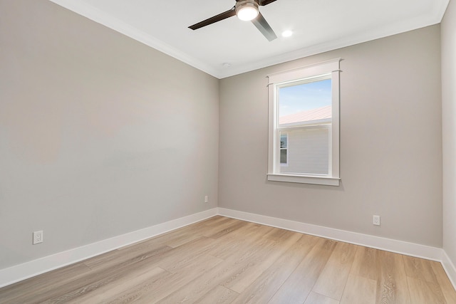 empty room with light wood-type flooring, ceiling fan, and crown molding