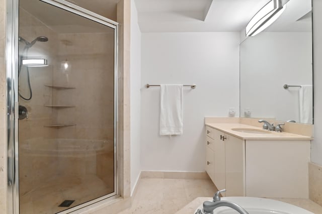 bathroom featuring vanity with extensive cabinet space, an enclosed shower, and tile flooring