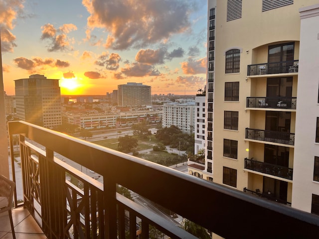 view of balcony at dusk