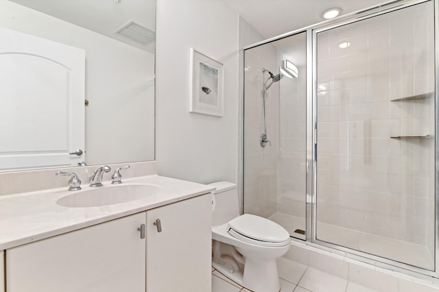 bathroom with walk in shower, vanity, toilet, and tile floors