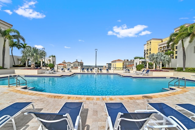 view of swimming pool with a patio area