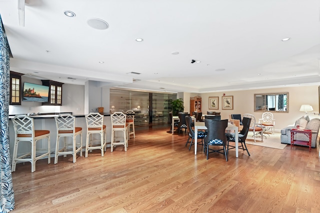 dining room with light hardwood / wood-style flooring