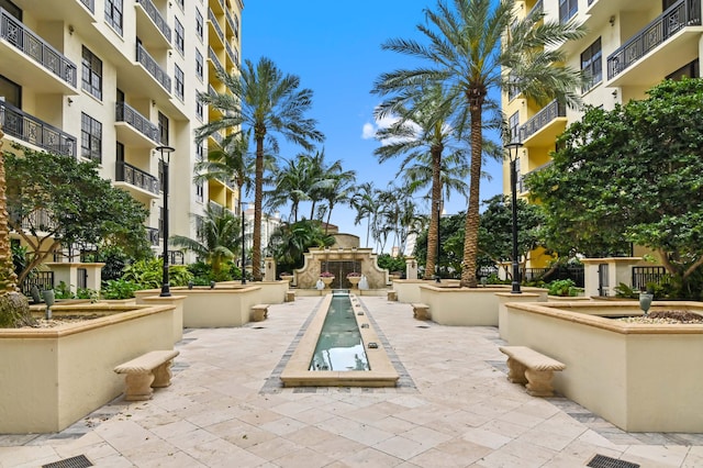 surrounding community featuring a patio