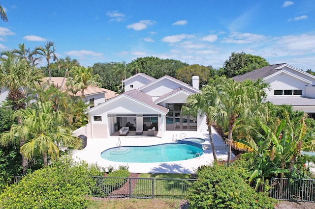 view of swimming pool featuring a patio area