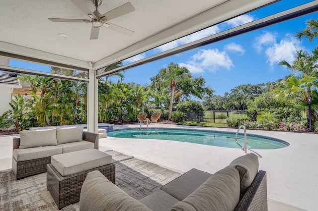 view of pool with a patio, ceiling fan, and an outdoor hangout area