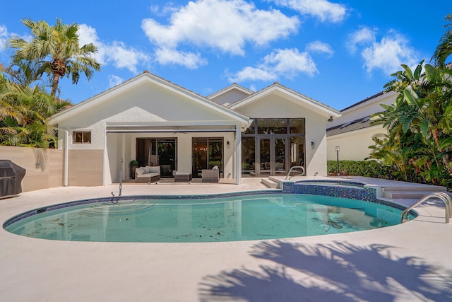 view of pool featuring a patio area