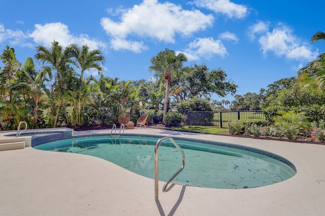 view of swimming pool featuring a patio