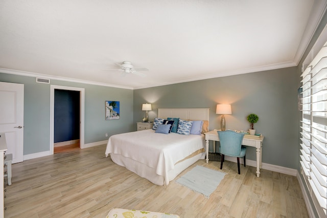 bedroom featuring ceiling fan, light hardwood / wood-style floors, and crown molding