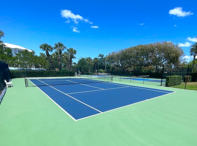 view of tennis court with basketball court