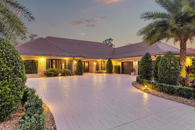 view of front of property featuring a garage