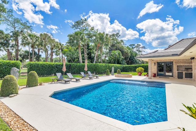 view of pool with a patio