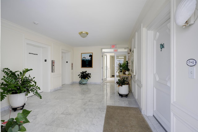 hallway featuring crown molding and french doors