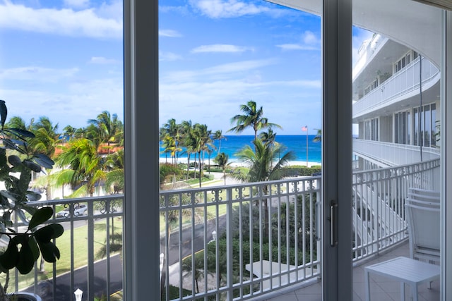 balcony featuring a water view