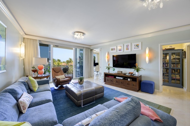 living room featuring a chandelier and crown molding