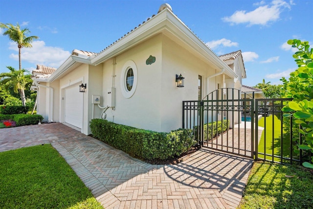 view of front of property with a garage