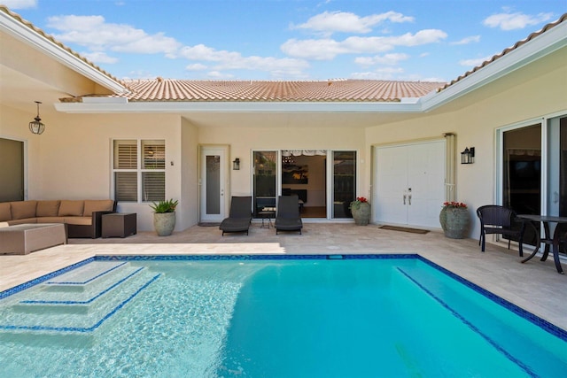 view of swimming pool with an outdoor hangout area and a patio