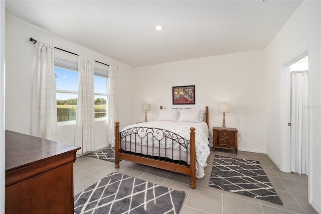 bedroom with light tile flooring