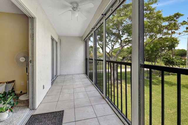 unfurnished sunroom featuring a barn door