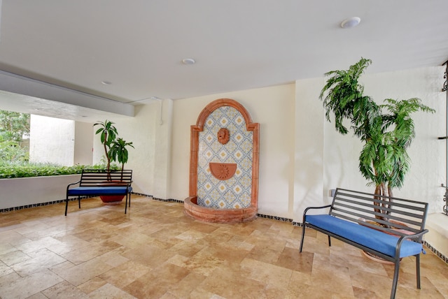 living area with light tile flooring