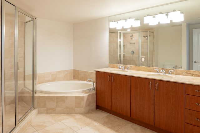 full bathroom featuring double sink, tile flooring, toilet, separate shower and tub, and oversized vanity