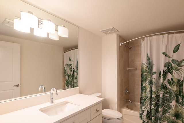 full bathroom with vanity, toilet, and shower / bath combination with curtain