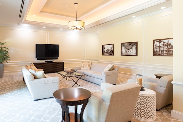 living room featuring ornamental molding, light carpet, and a raised ceiling