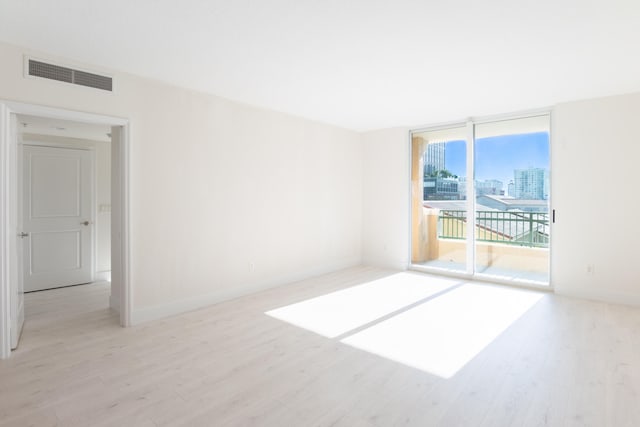 empty room featuring light hardwood / wood-style floors