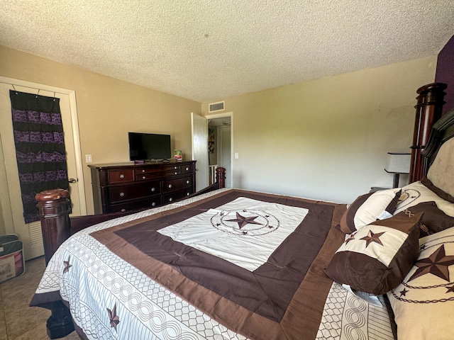 bedroom with a textured ceiling