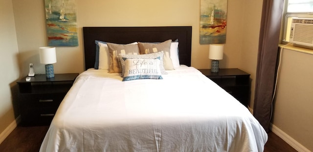 bedroom featuring dark hardwood / wood-style floors