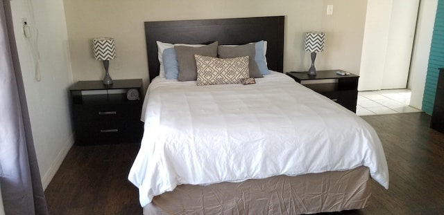 bedroom with light hardwood / wood-style flooring