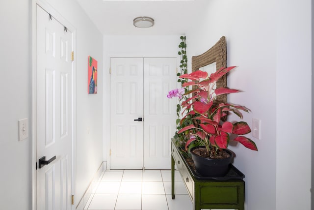 corridor with light tile flooring