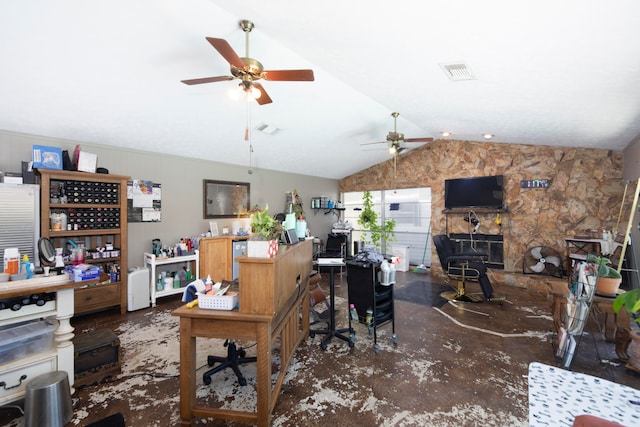 home office featuring lofted ceiling, ceiling fan, and a fireplace