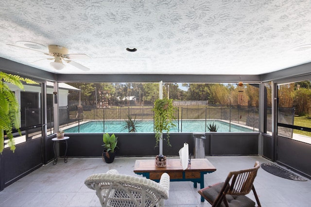 sunroom / solarium with ceiling fan