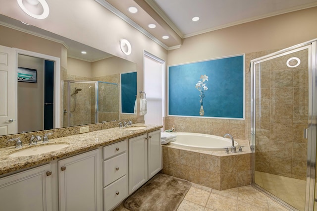 bathroom featuring tile floors, double sink, crown molding, plus walk in shower, and oversized vanity