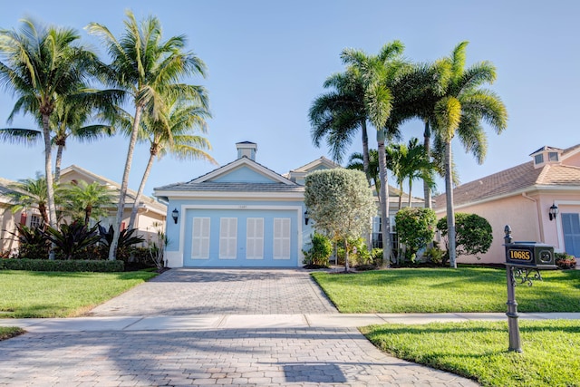 view of front of home with a front lawn