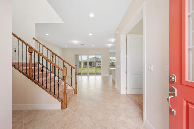 entrance foyer with light tile flooring