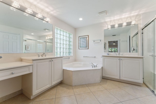 bathroom with separate shower and tub, tile patterned flooring, and vanity