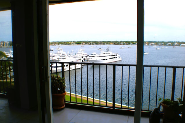 balcony featuring a water view