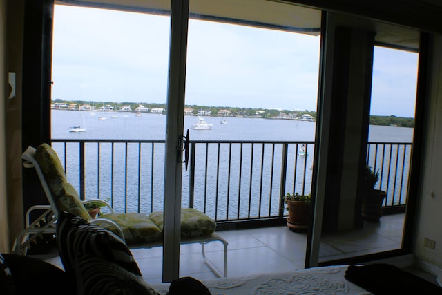 balcony featuring a water view