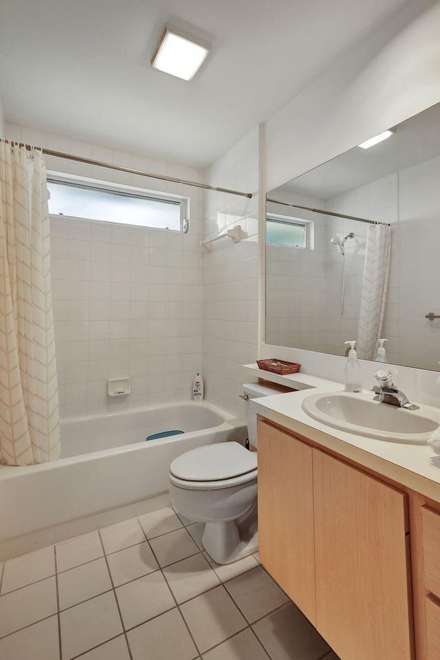 full bathroom featuring toilet, tile patterned floors, shower / bathtub combination with curtain, and vanity