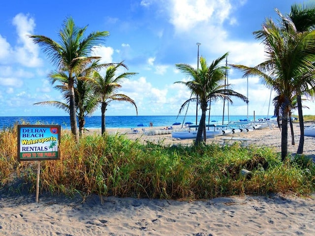 view of water feature with a beach view