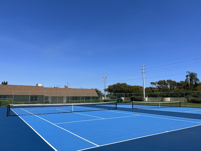 view of tennis court with basketball court