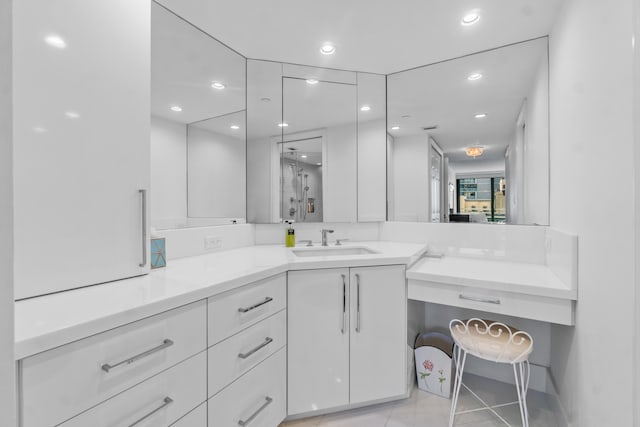 bathroom with vanity and tile floors