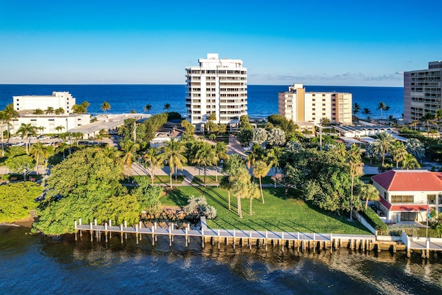 birds eye view of property featuring a water view