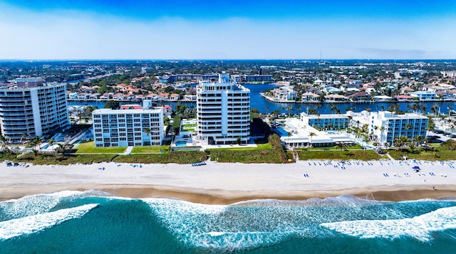 aerial view featuring a water view and a beach view