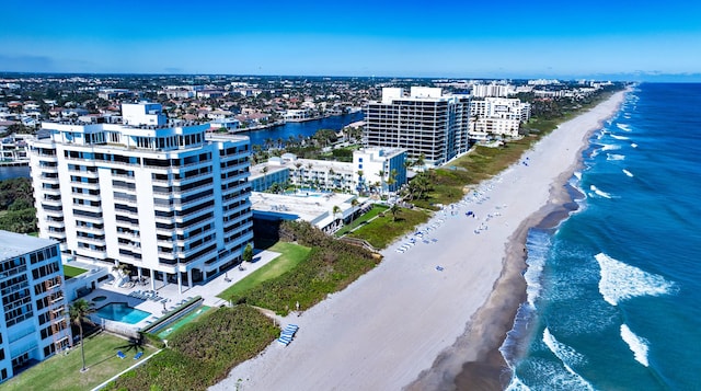 drone / aerial view with a view of the beach and a water view