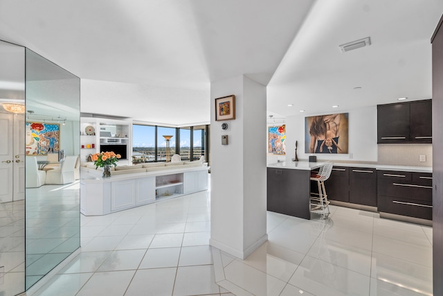 interior space featuring vanity and tile flooring