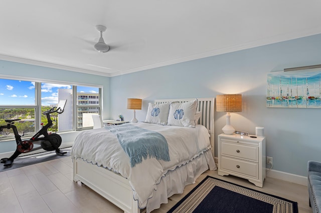 bedroom with crown molding and ceiling fan