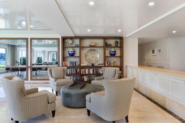 living room with light tile patterned flooring