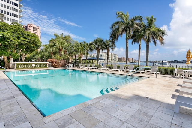 view of swimming pool featuring a patio area